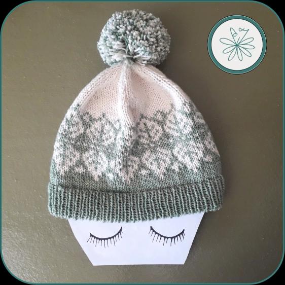 Knitted winter hat with pompom Leaf Pattern