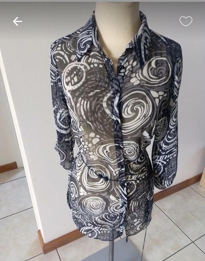 Woman's sheer blouse size 12