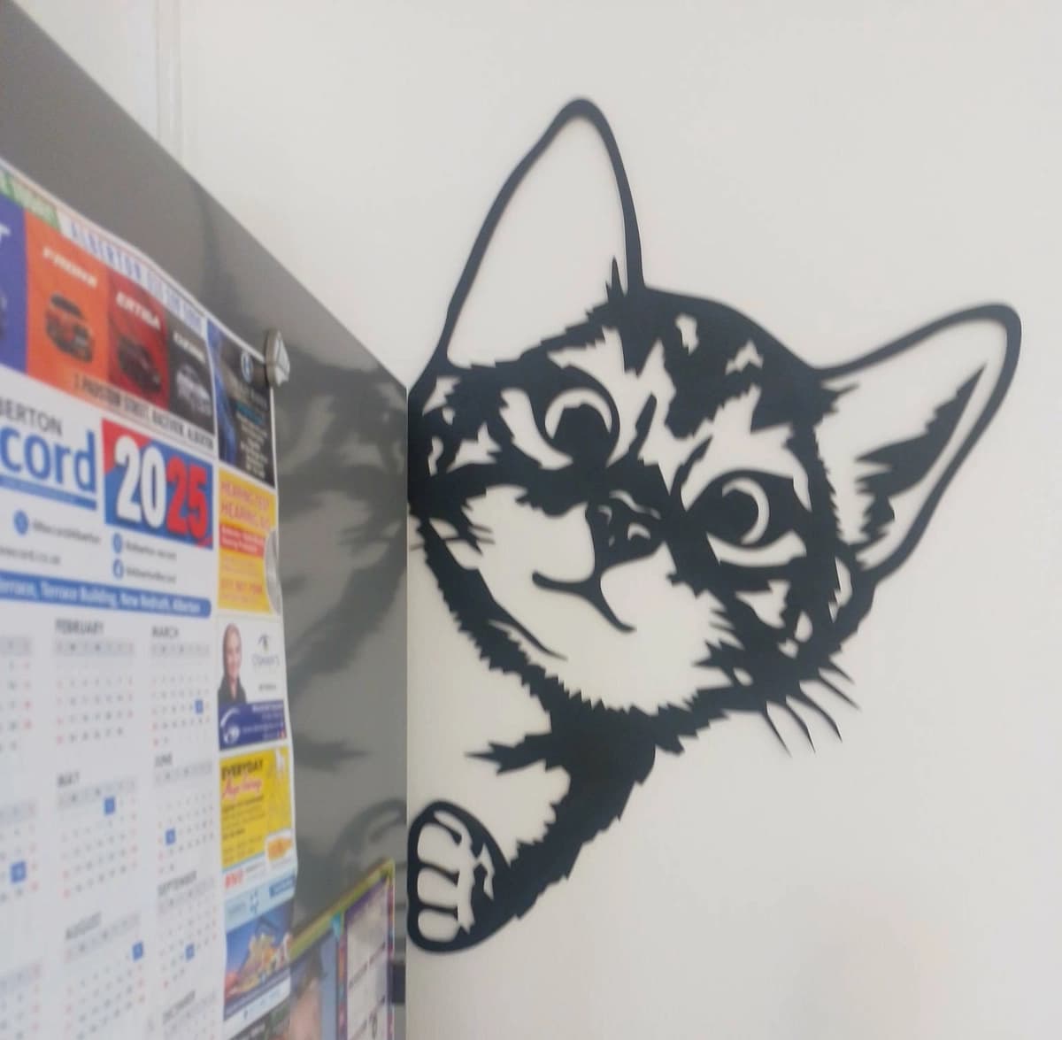 Peeping cat. Made from MDF. Not suitable for outside.