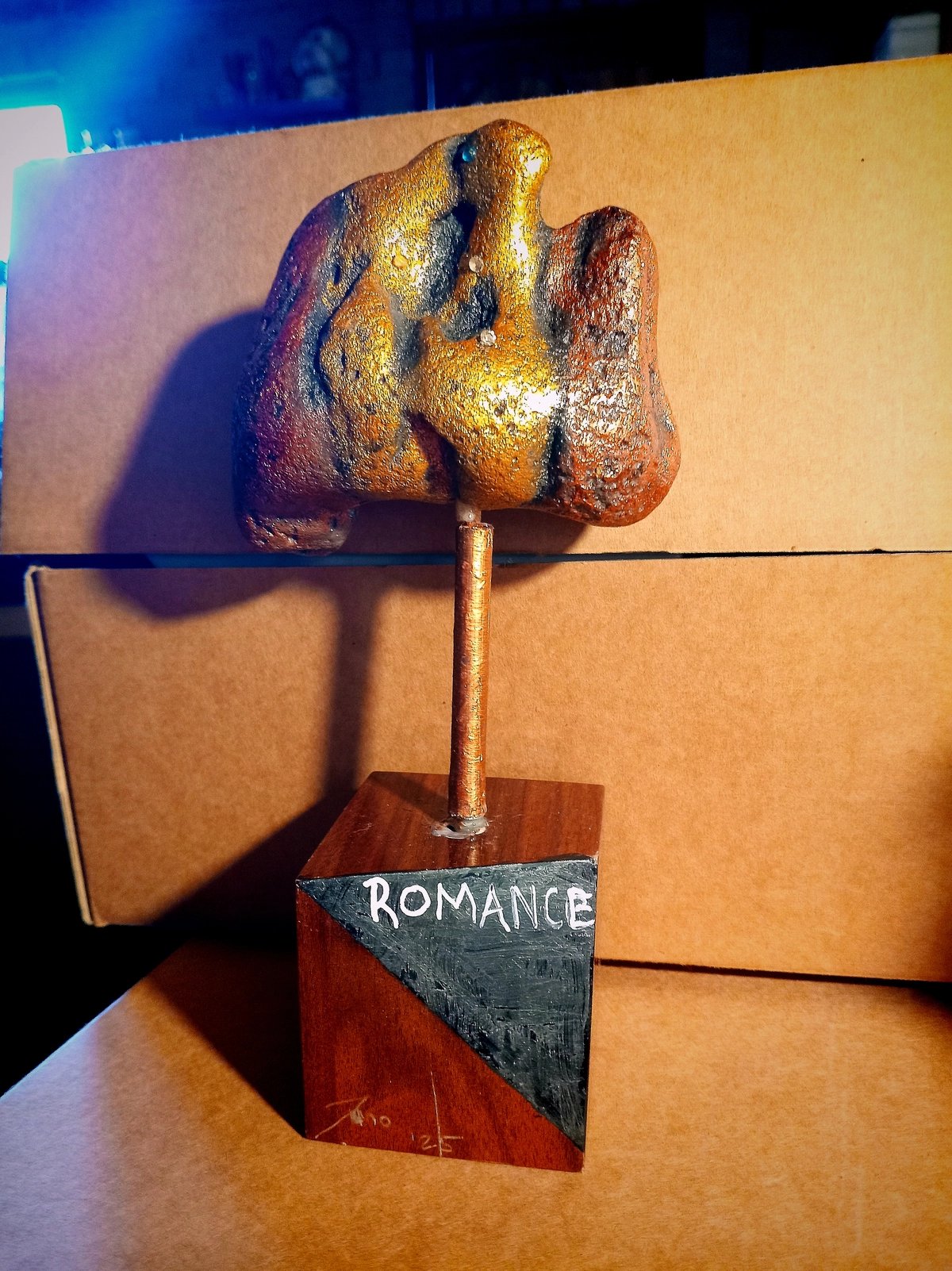 Statue - Stone artistic depiction - titled 'Romance'