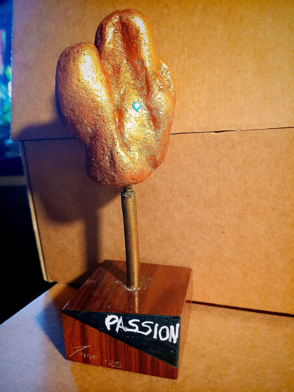 Statue - Stone artistic depiction - titled 'Passion'