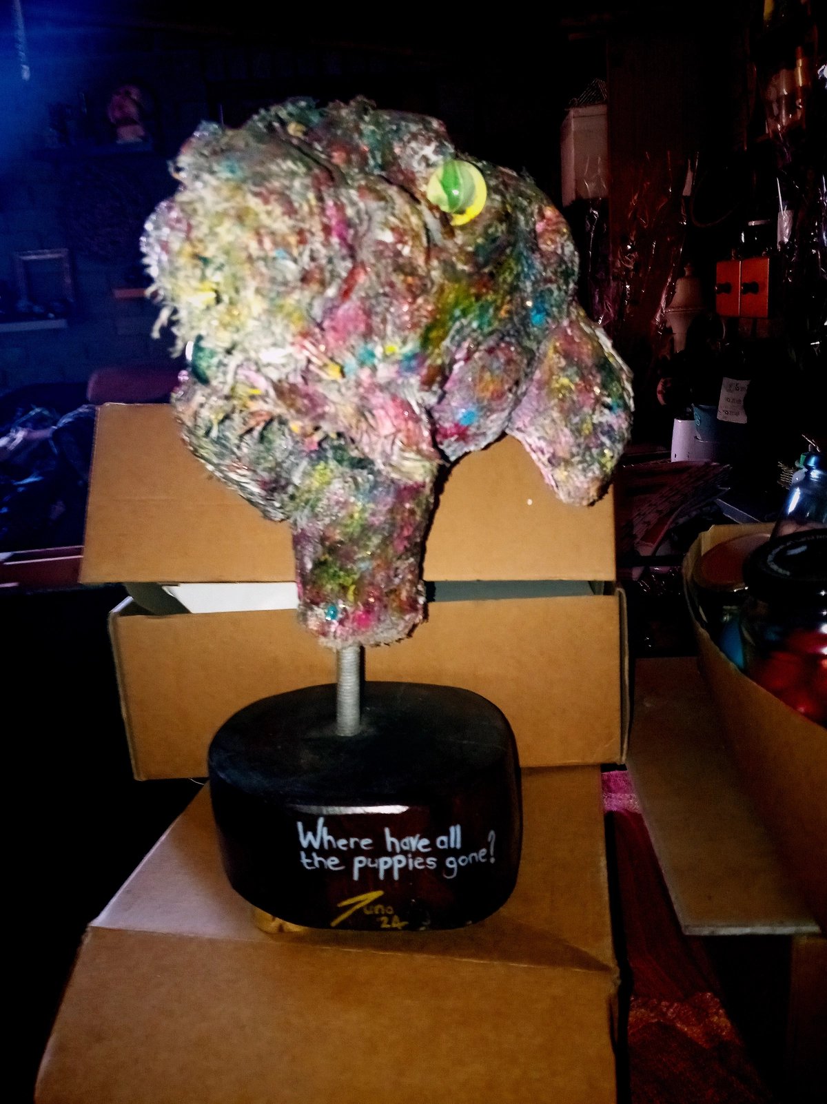 Statue - Beach Grass Ball - artistic depiction - titled 'Where have all the puppies gone.